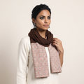 Beige Handcrafted Patchwork Woollen Stole, worn by a woman, AI visual of the stole, iTokri