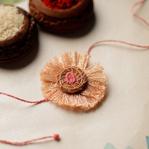  Handcrafted Pine Needles Hibiscus Rakhi by Pirul 
