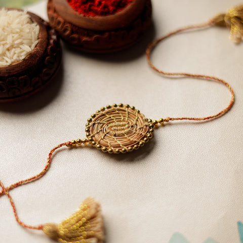  Handcrafted Pine Needles Hibiscus Rakhi by Pirul 