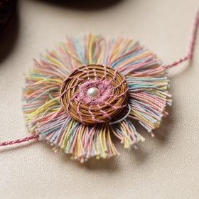  Handcrafted Pine Needles Hibiscus Rakhi by Pirul 
