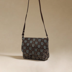Handcrafted quilted ajrakh block printed fabric sling bag