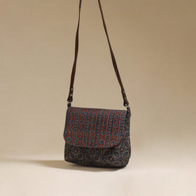 Handcrafted quilted ajrakh block printed fabric sling bag