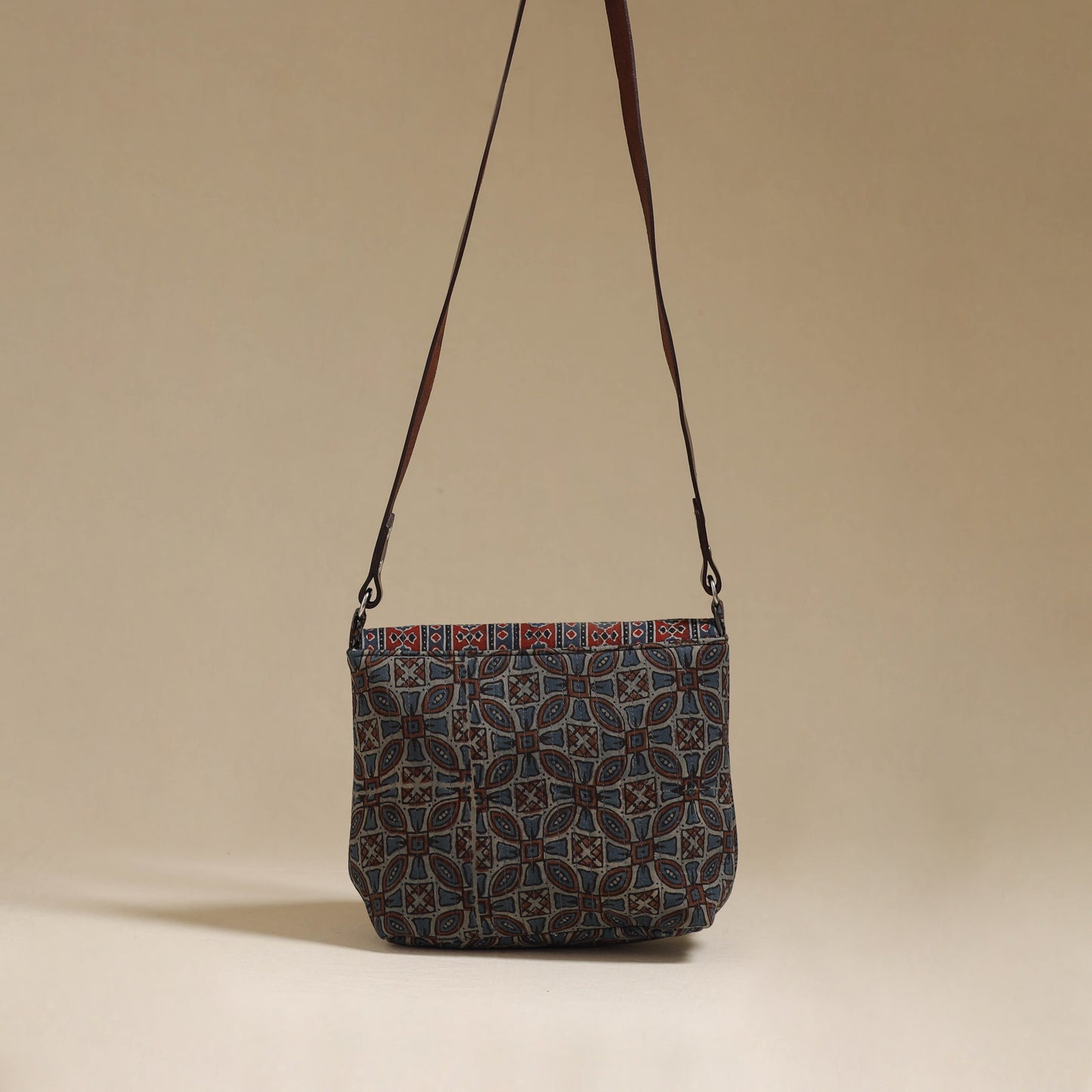 Handcrafted quilted ajrakh block printed fabric sling bag