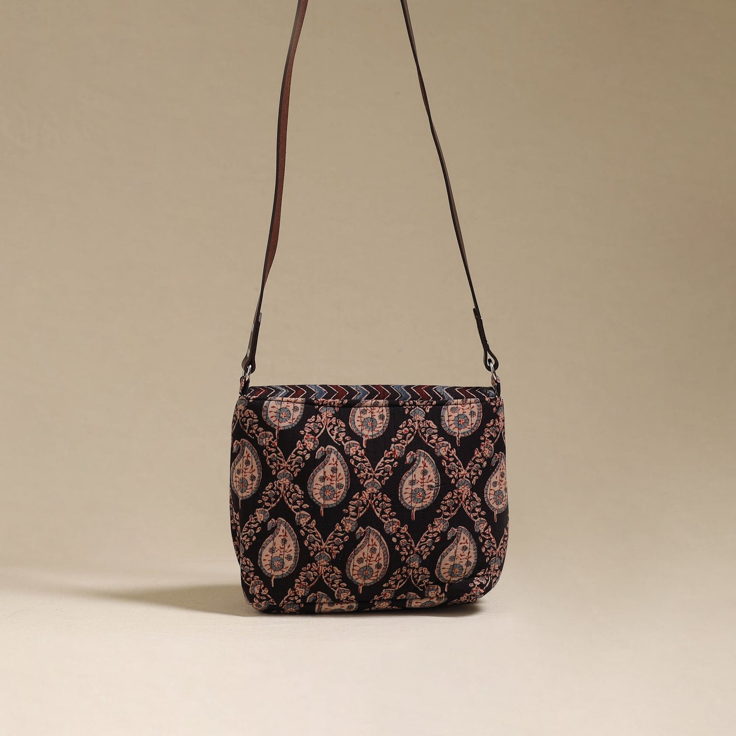 Handcrafted quilted ajrakh block printed fabric sling bag