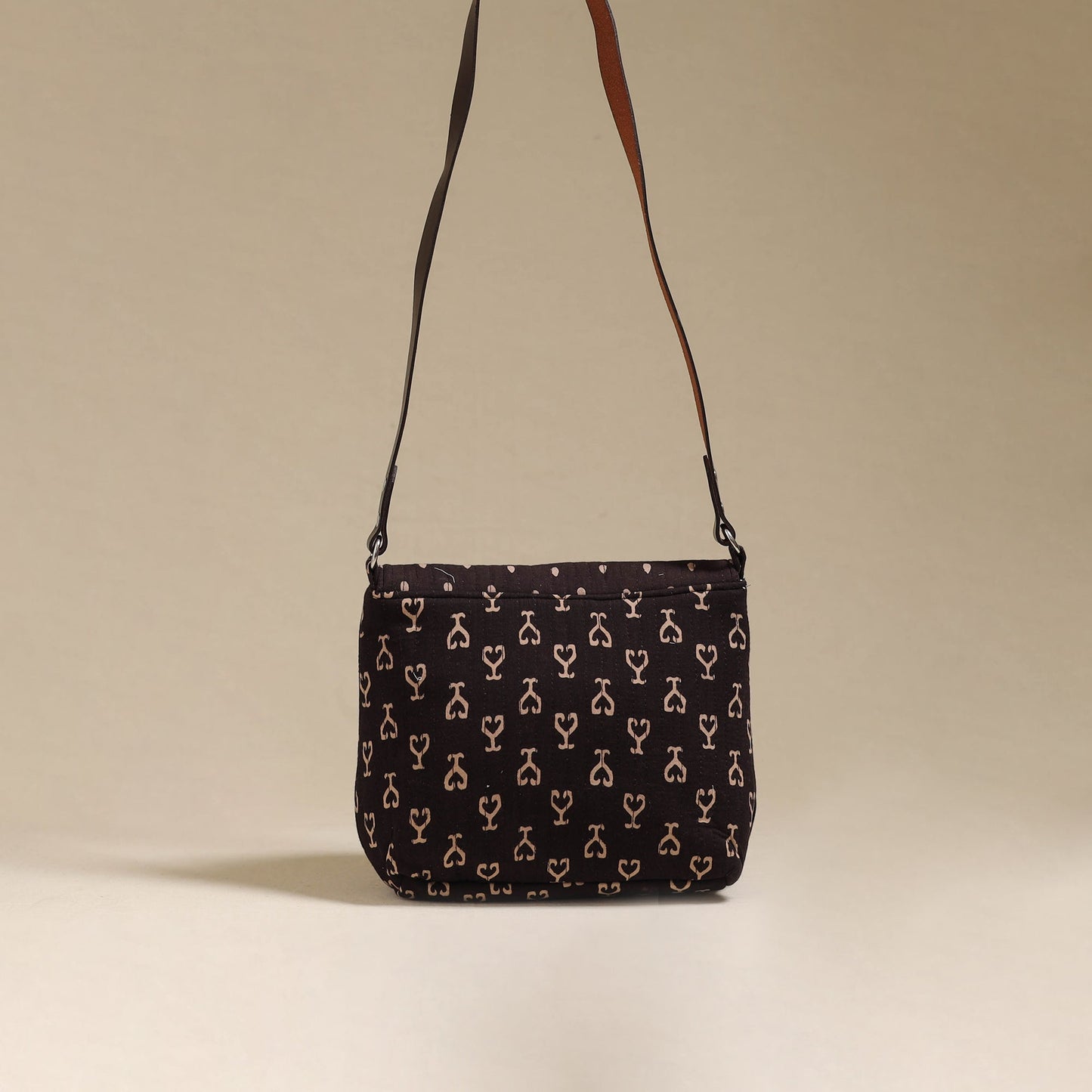 Handcrafted quilted ajrakh block printed fabric sling bag