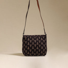 Handcrafted quilted ajrakh block printed fabric sling bag