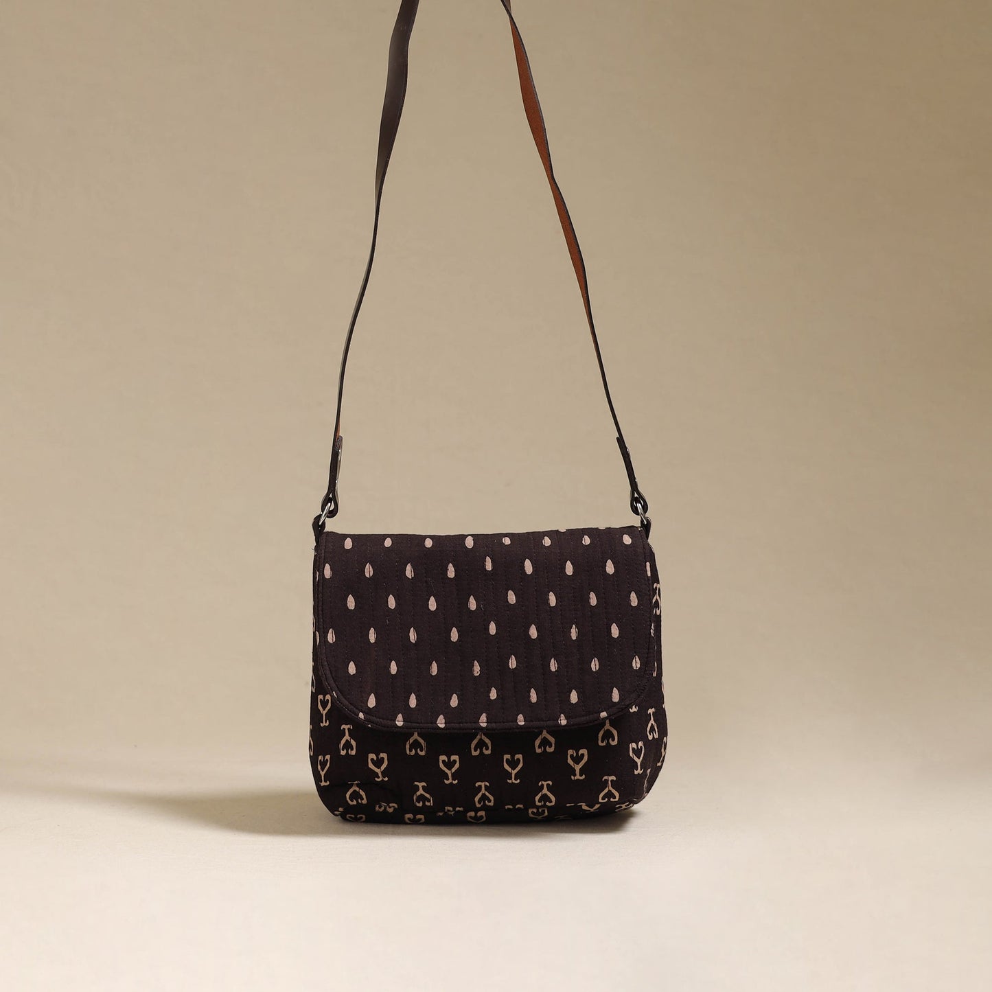 Handcrafted quilted ajrakh block printed fabric sling bag