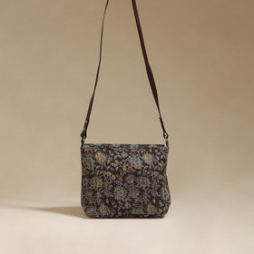 Handcrafted quilted ajrakh block printed fabric sling bag
