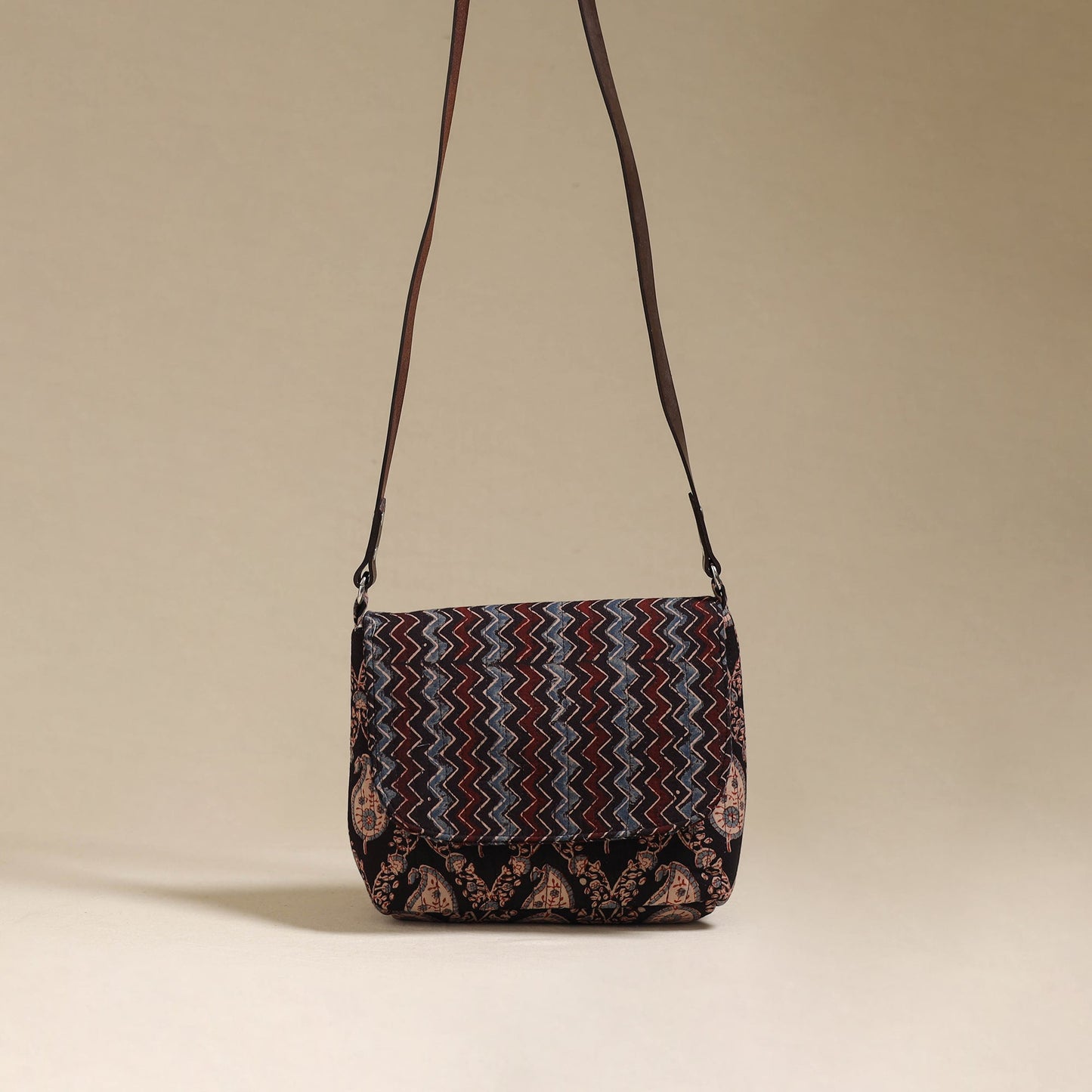 Handcrafted quilted ajrakh block printed fabric sling bag
