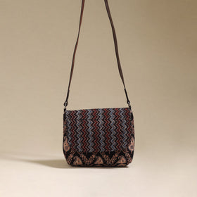 Handcrafted quilted ajrakh block printed fabric sling bag