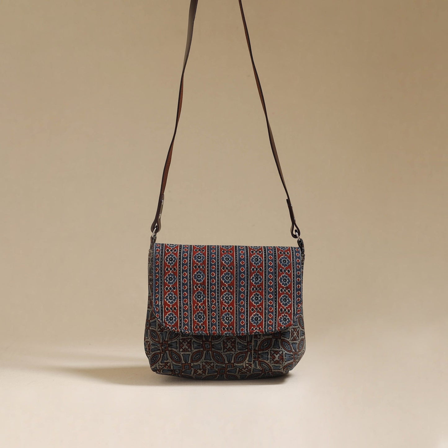 Handcrafted quilted ajrakh block printed fabric sling bag