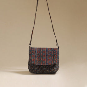 Handcrafted quilted ajrakh block printed fabric sling bag