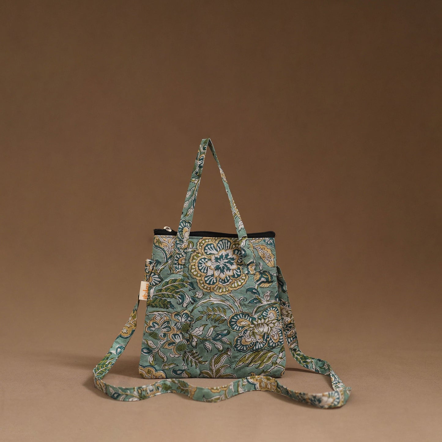 Handcrafted quilted sling bag 01