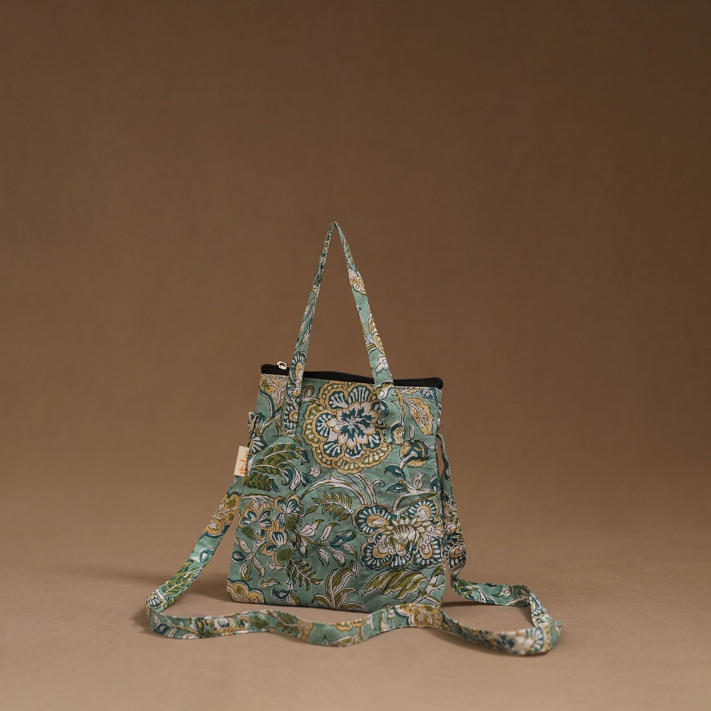 Handcrafted quilted sling bag 01