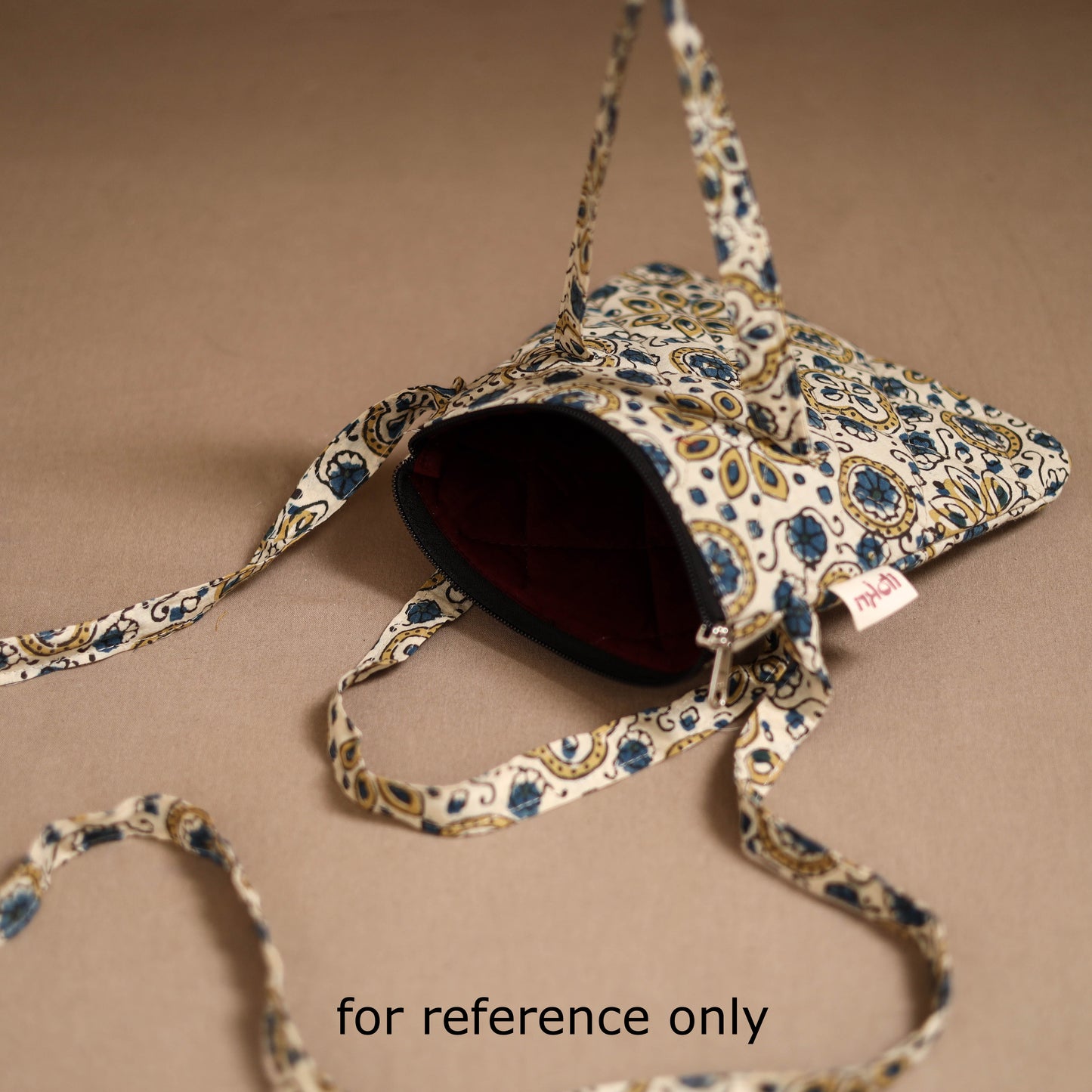 Handcrafted quilted sling bag 01