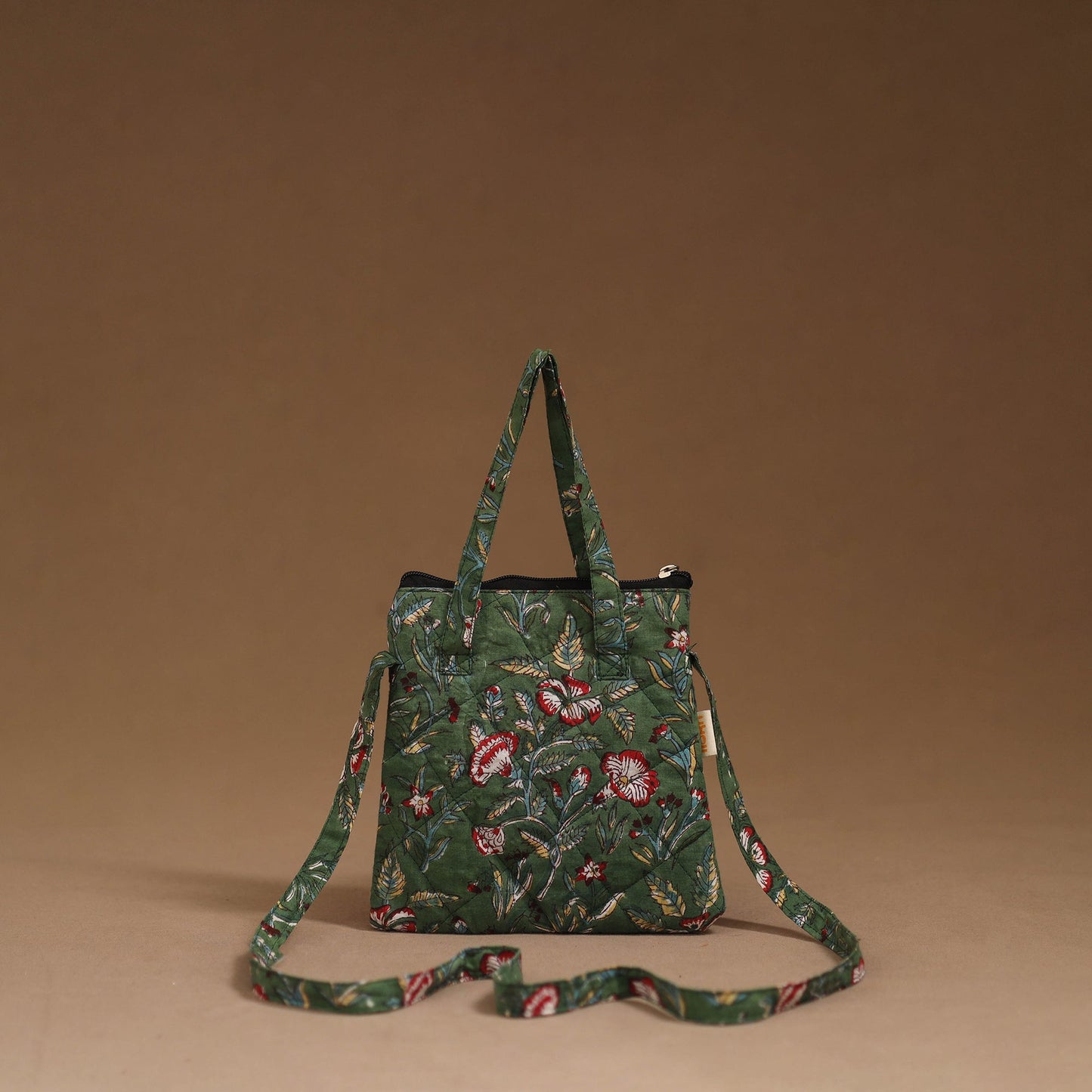 Handcrafted quilted sling bag 10