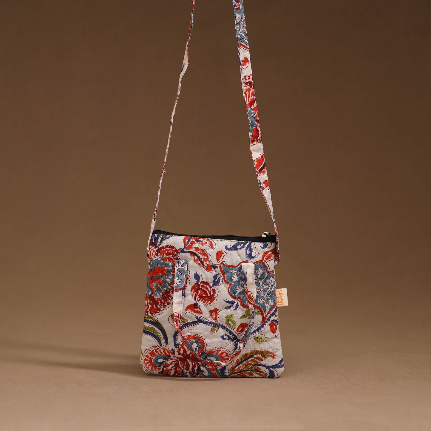 Handcrafted quilted sling bag 11