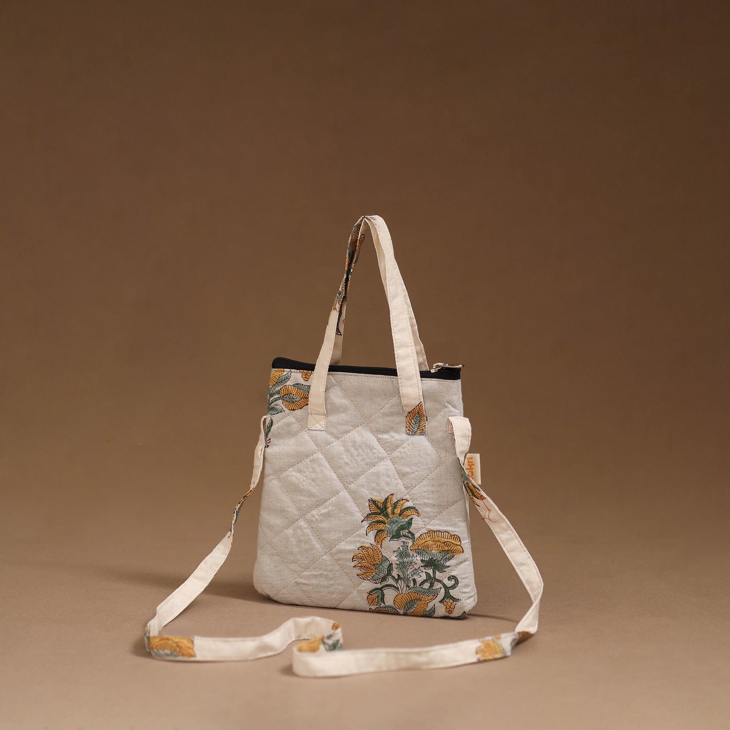 Handcrafted quilted sling bag 12