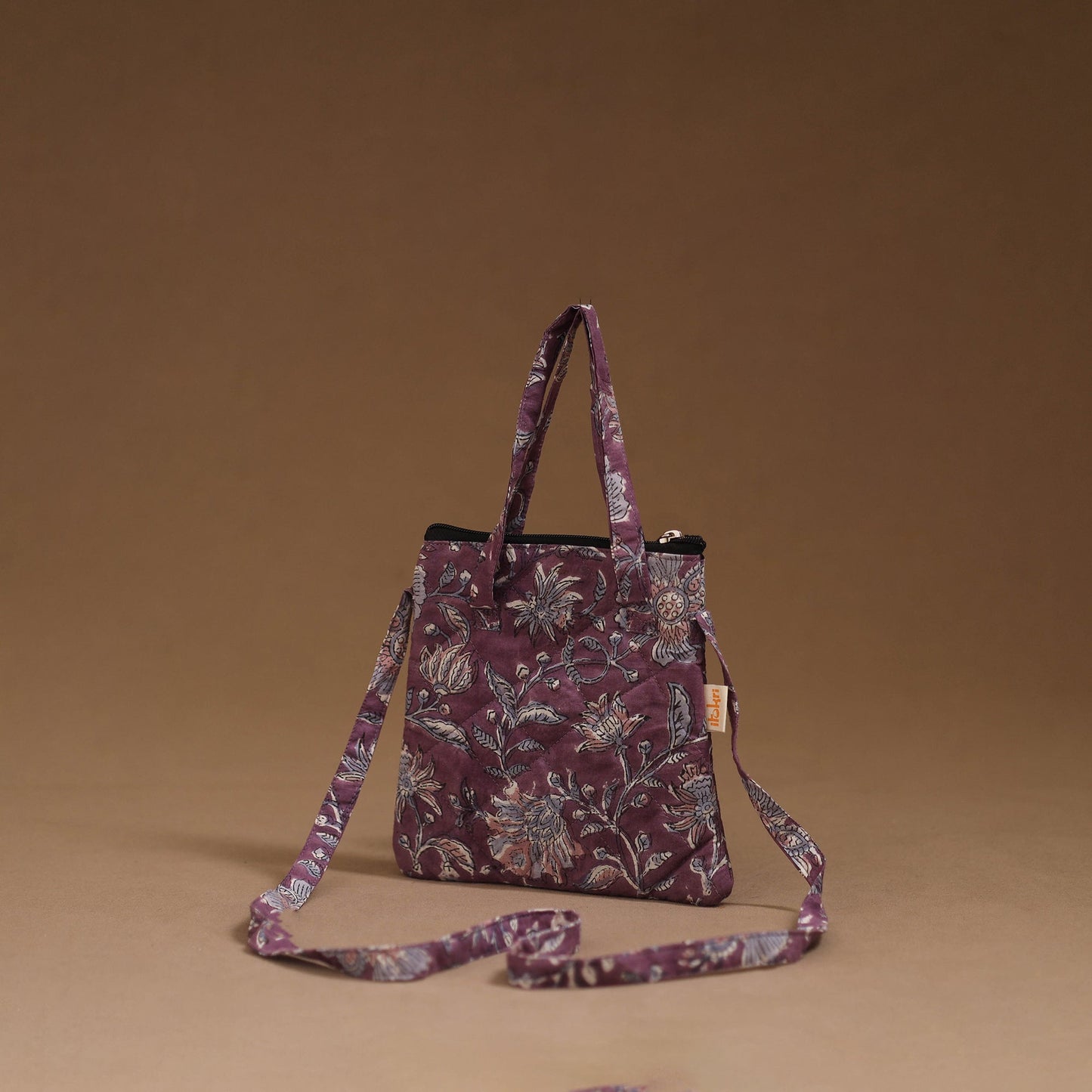 Handcrafted quilted sling bag 13