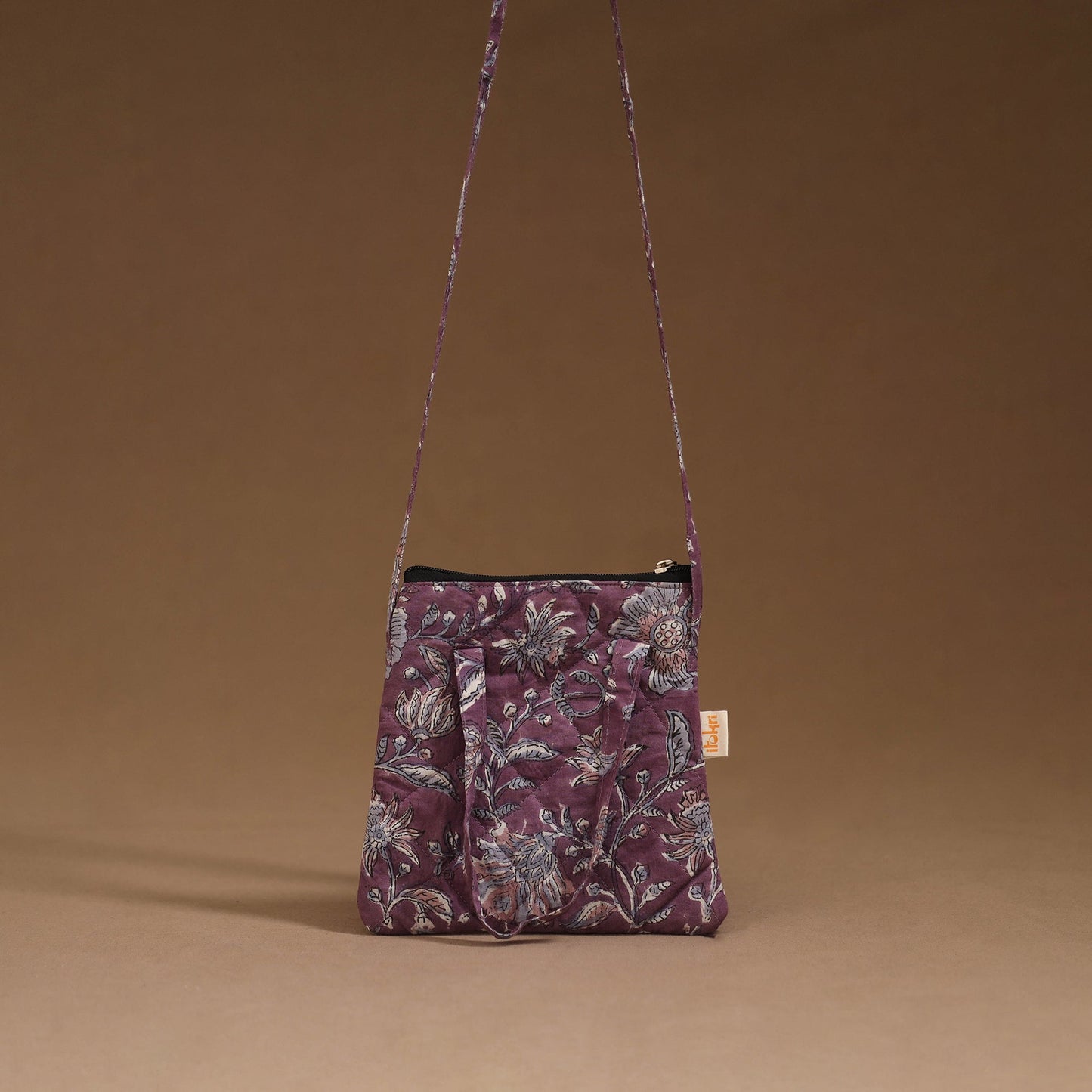 Handcrafted quilted sling bag 13