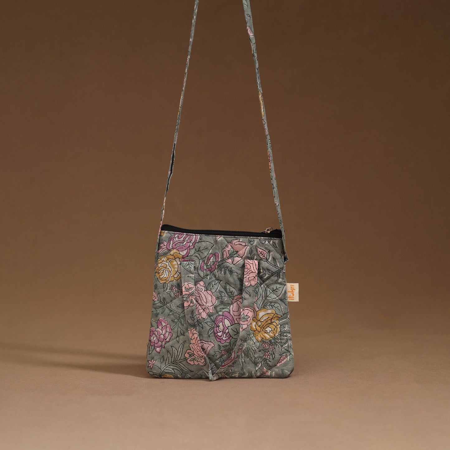 Handcrafted quilted sling bag 14