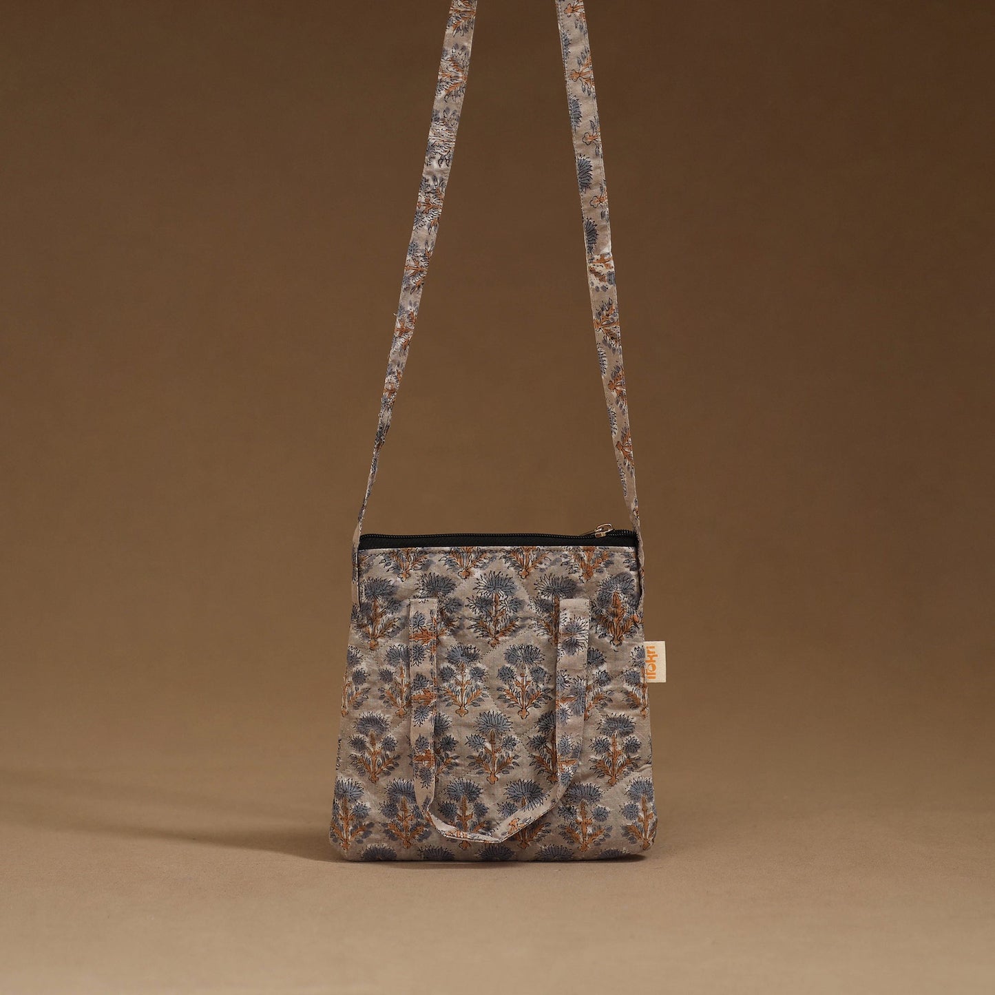 Handcrafted quilted sling bag 17