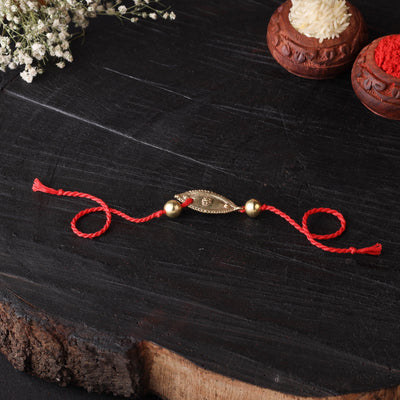 Handcrafted tribal dokra brass thread rakhi 02