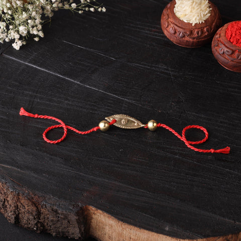 Handcrafted tribal dokra brass thread rakhi 02