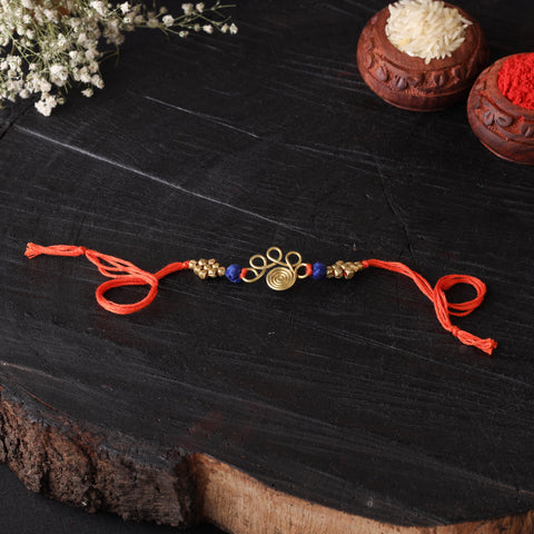 Handcrafted tribal dokra brass thread rakhi 05