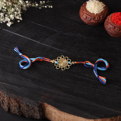 Handcrafted tribal dokra brass thread rakhi 06
