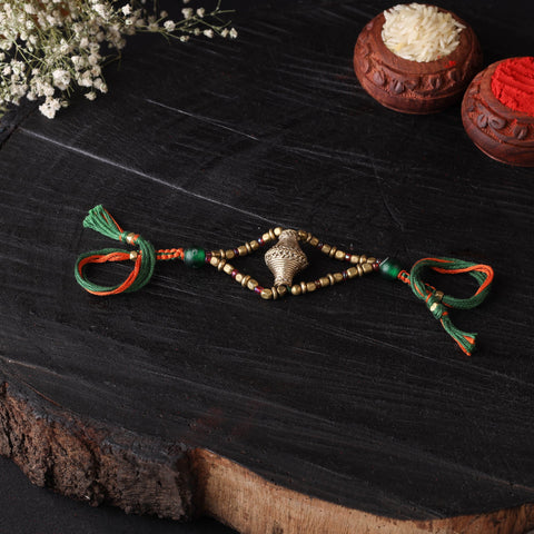 Handcrafted tribal dokra brass thread rakhi 25