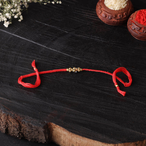 Handcrafted tribal dokra brass thread rakhi 42