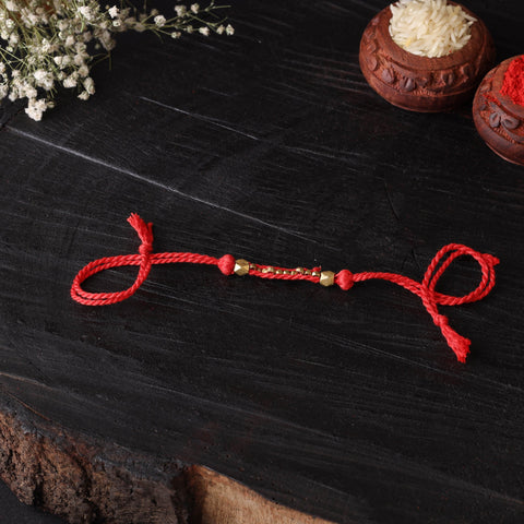 Handcrafted tribal dokra brass thread rakhi 47