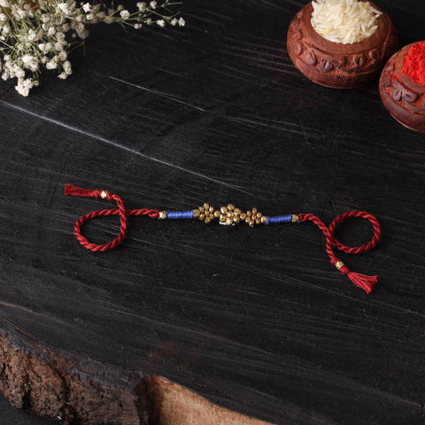 Handcrafted tribal dokra brass thread rakhi 51