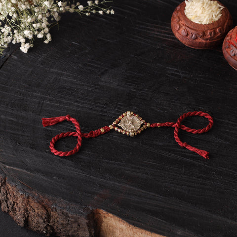 Handcrafted tribal dokra brass thread rakhi 53