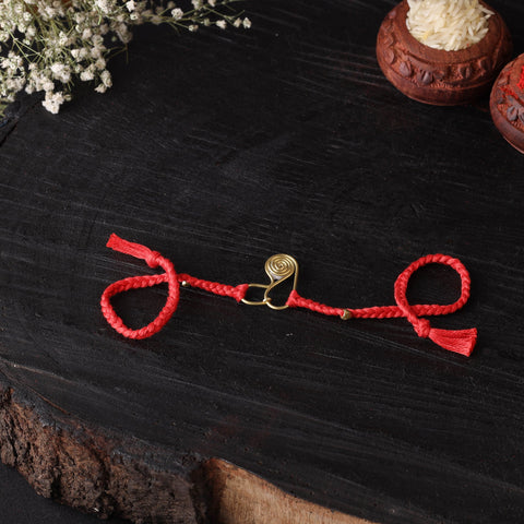Handcrafted tribal dokra brass thread rakhi 55