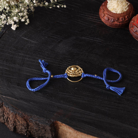 Handcrafted tribal dokra brass thread rakhi 56