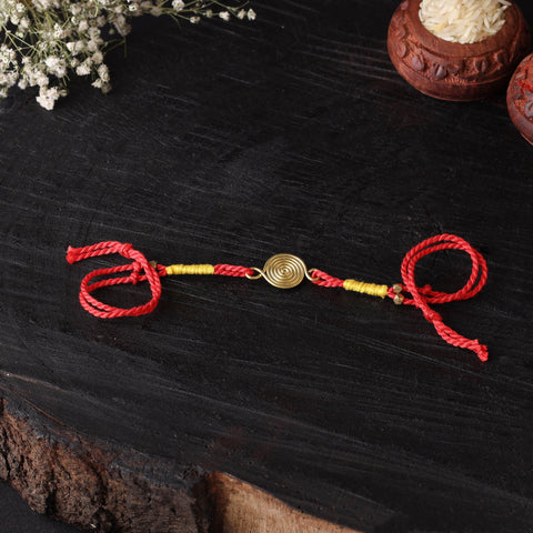 Handcrafted tribal dokra brass thread rakhi 57