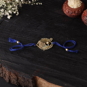 Handcrafted tribal dokra brass thread rakhi 60