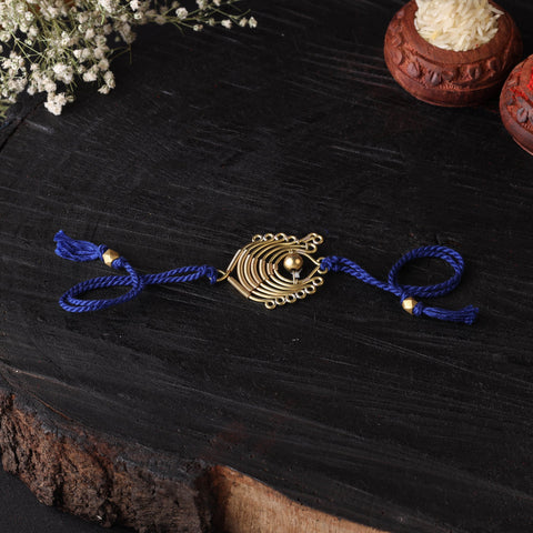 Handcrafted tribal dokra brass thread rakhi 60