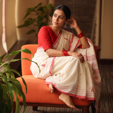 White Handloom Cotton Burdwan Jamdani Saree, draped and worn by a woman, AI visual of the saree, iTokri