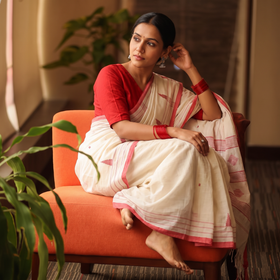 White Handloom Cotton Burdwan Jamdani Saree, draped and worn by a woman, AI visual of the saree, iTokri