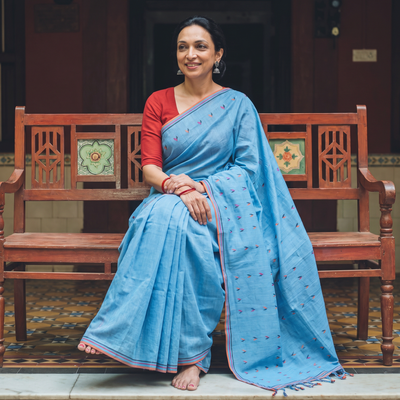 Blue Handloom Cotton Buti Srikakulam Jamdani Saree, draped and worn by a woman, AI visual of the saree, iTokri