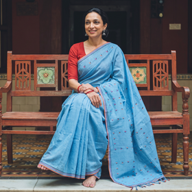 Blue Handloom Cotton Buti Srikakulam Jamdani Saree, draped and worn by a woman, AI visual of the saree, iTokri