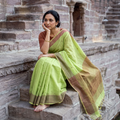 Green Handloom Cotton Buti Srikakulam Jamdani Saree, draped and worn by a woman, AI visual of the saree, iTokri