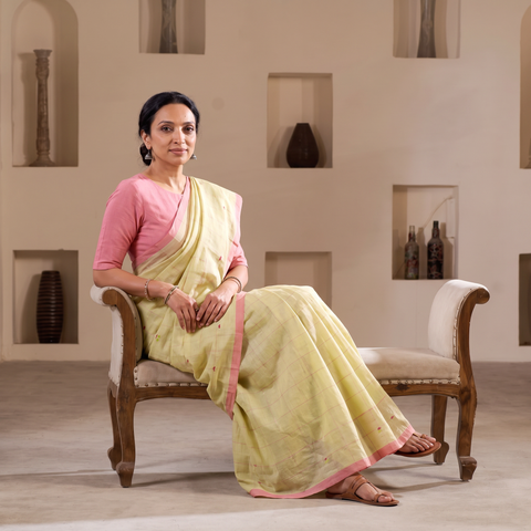 Yellow Handloom Cotton Buti Srikakulam Jamdani Saree, draped and worn by a woman, AI visual of the saree, iTokri