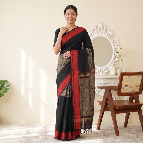 Black Handloom Cotton Phulia Bengal Jamdani Saree, draped and worn by a woman, AI visual of the saree, iTokri