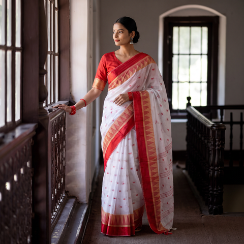 White Handloom Cotton Phulia Jamdani Saree, draped and worn by a woman, AI visual of the saree, iTokri