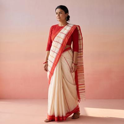 White Handloom Cotton Phulia Jamdani Saree, draped and worn by a woman, AI visual of the saree, iTokri