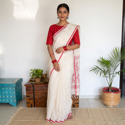 White Handloom Cotton Phulia Jamdani Saree, draped and worn by a woman, AI visual of the saree, iTokri